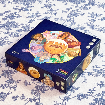 Soggy Biscuit Hidden Role Card Game Box on a floral tablecloth